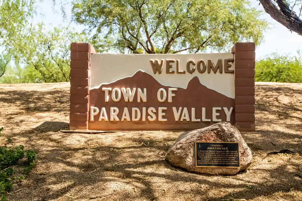 A sign reads Welcome Town of Paradise Valley.